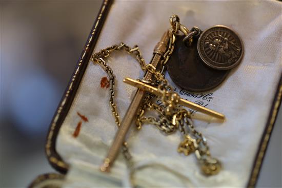 An 18ct two colour gold keyless dress pocket watch and an 18ct gold albert hung with a coin, medallion and 9ct gold swizzle stick,